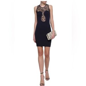 ROBERTO CAVALLI
Lace-paneled ribbed-knit mini dress size 44 (US 12)